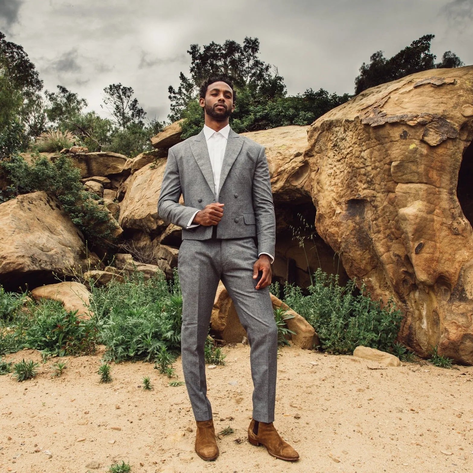 Gray cropped double breast peak lapel suit