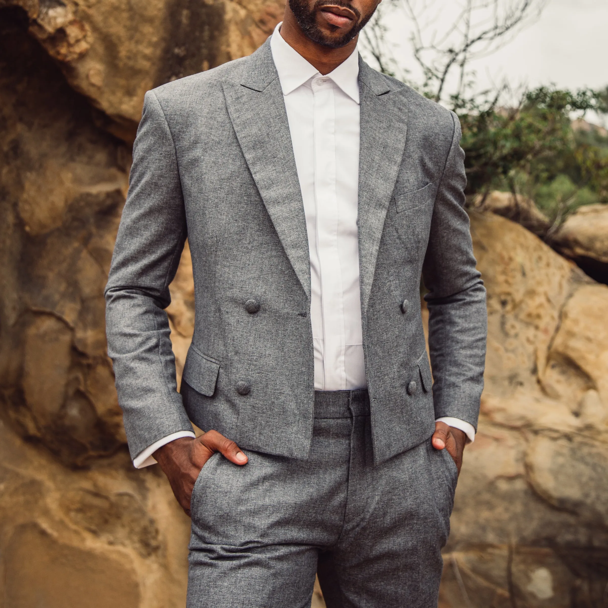 Gray cropped double breast peak lapel suit